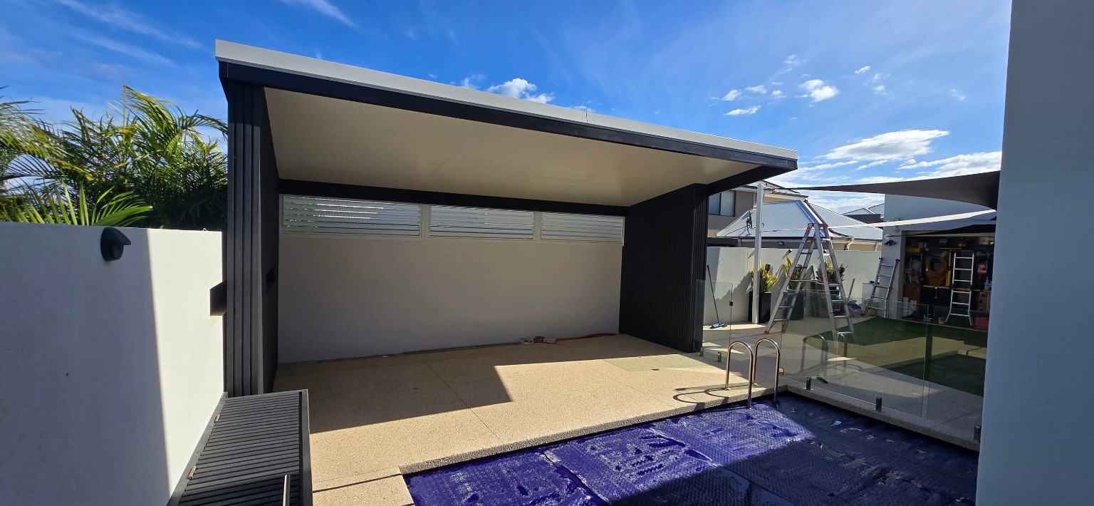 Dark custom shelter structure under construction