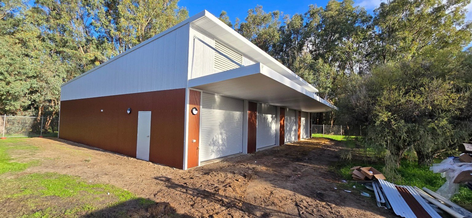 Large custom shed with multiple roller doors